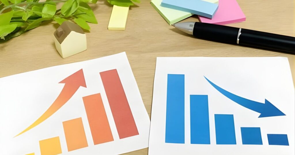 不動産売却価格の相場変動や理由による価格への影響を示す上昇と下降のグラフ